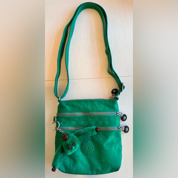 Kipling Handbags - KIPLING BAG!! Alvar Extra Small size with monkey keychain